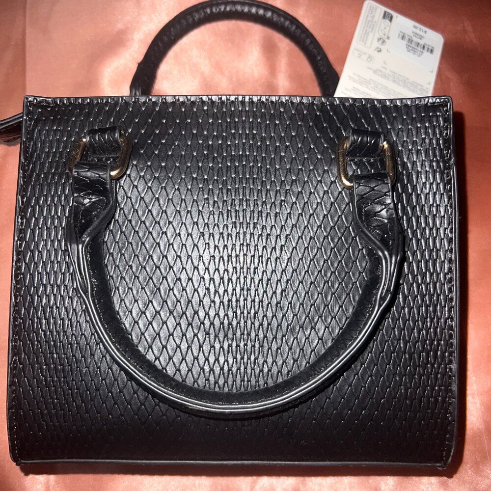 black textured handbag